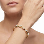 Gold Wavy Pearl Bangle – Sculptural Fashion Jewellery Bracelet