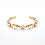 Gold Wavy Pearl Bangle – Sculptural Fashion Jewellery Bracelet