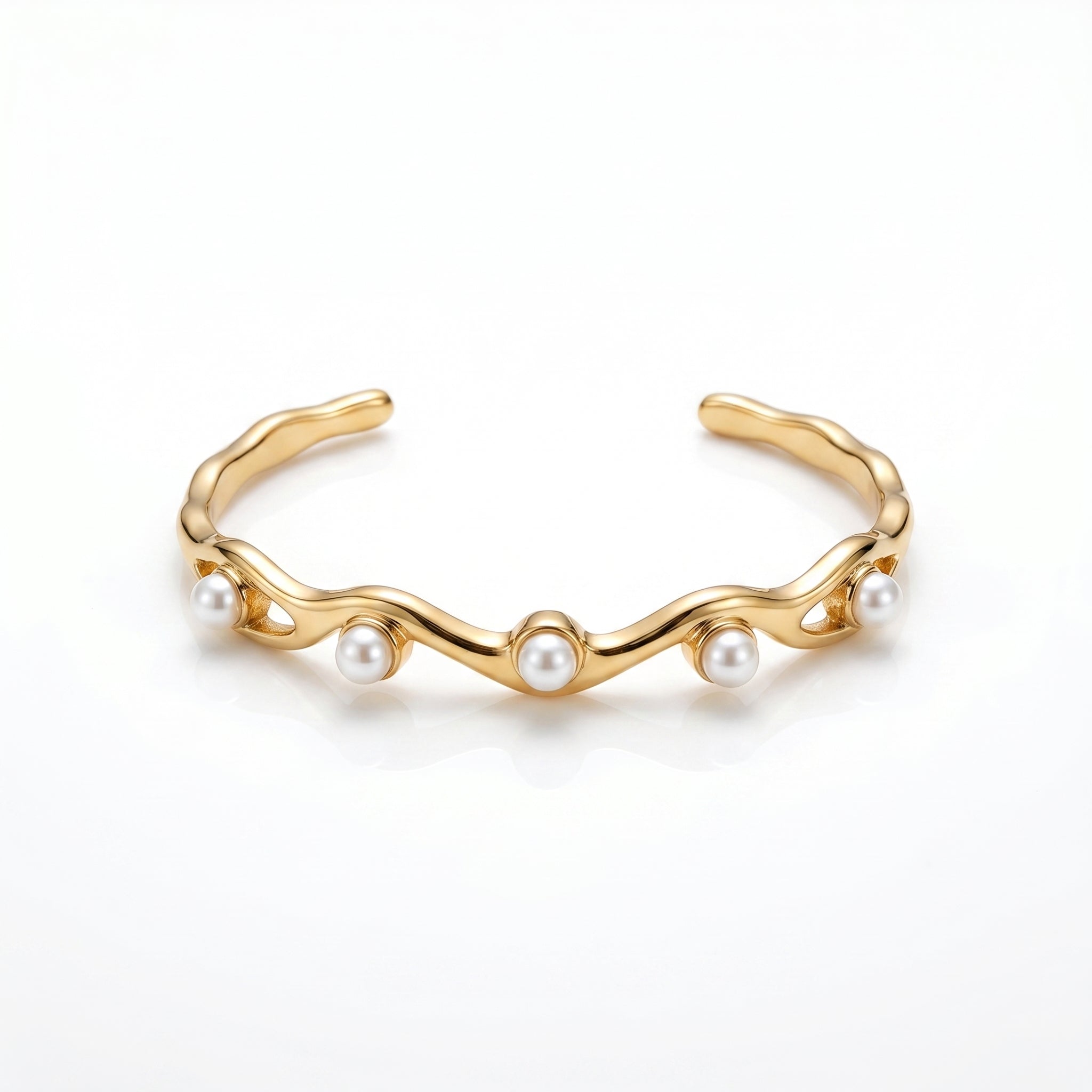 Gold Wavy Pearl Bangle – Sculptural Fashion Jewellery Bracelet