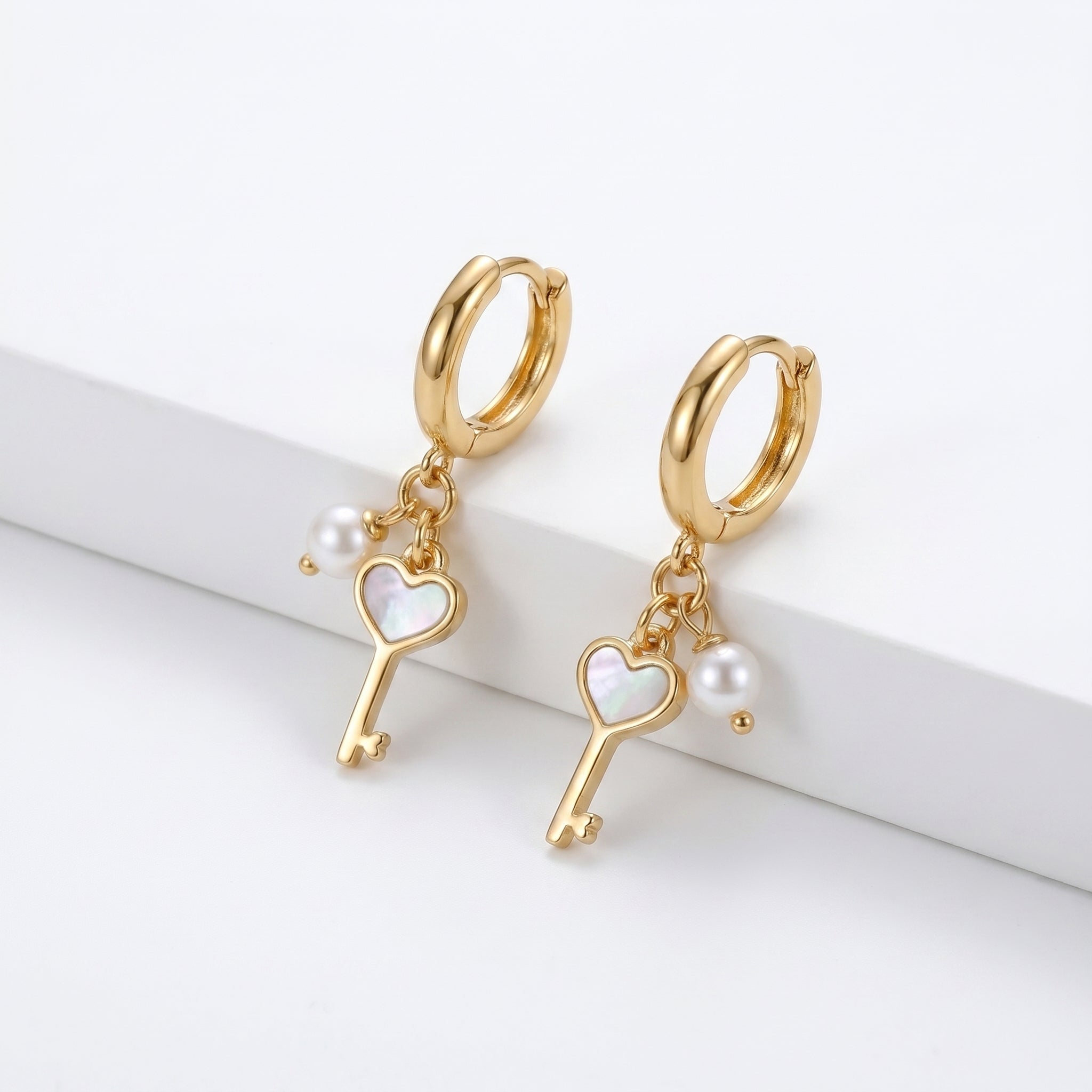 Heart Key & Pearl Charm Huggie Earrings – Gold Fashion Jewellery